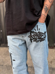 Calça jeans reta estampada trip side - Azul escuro